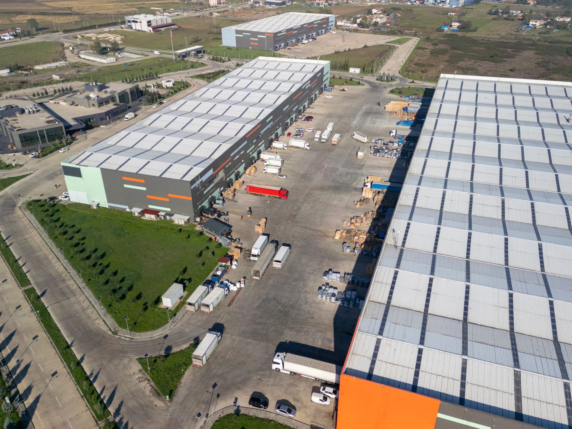 Aerial view of industrial warehouses and distribution center buildings